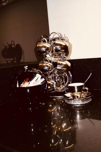 a group of silver objects sitting on a table at Carpe Diem in Beaulieu-sur-Mer