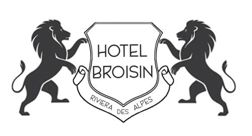 two lions standing on a shield with the words hotel brooklyn disney mixes at Initial by balladins, Hôtel Restaurant Broisin in Aix-les-Bains