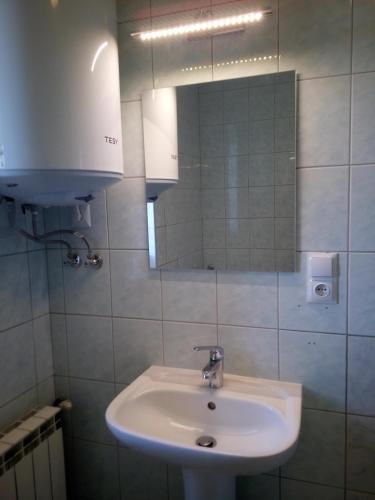 Koupelna v ubytování Apartamenty i pokoje Pluszak