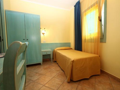 Postel nebo postele na pokoji v ubytování Hotel Del Corso