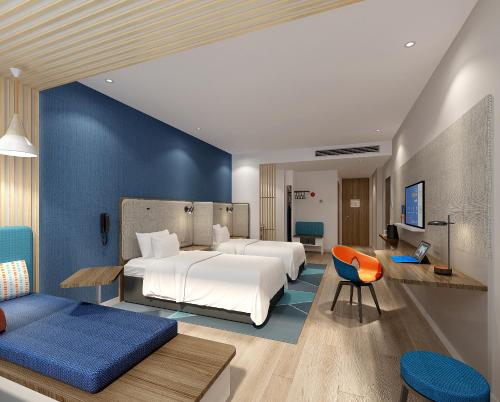 Ένα ή περισσότερα κρεβάτια σε δωμάτιο στο Holiday Inn Express Pinghu by IHG