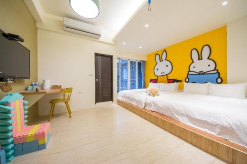 Katil atau katil-katil dalam bilik di Child house holiday home