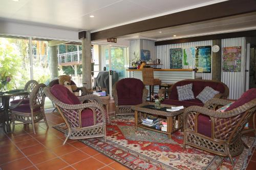 Χώρος καθιστικού στο Licuala Lodge