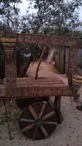 a wooden cart with two baskets on top of it at Petalo Rosso b&b in Lenola