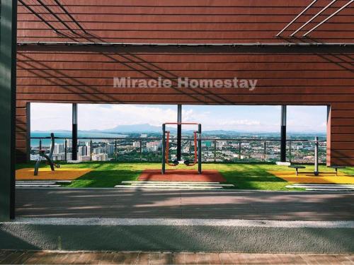 a building with a sign that reads miracle homesay at Miracle Woodsbury Habour Place Butterworth in Butterworth