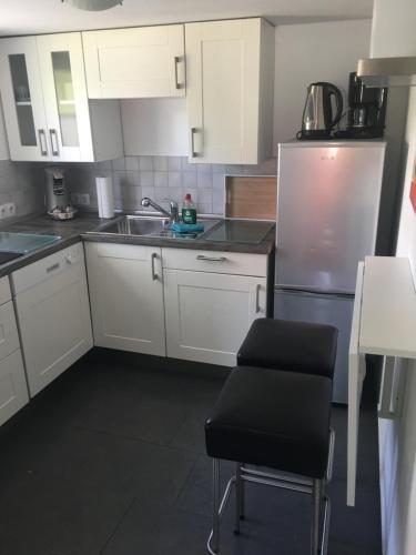 Kuchyň nebo kuchyňský kout v ubytování Haus Lindenteichblick