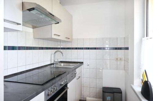 Kuchyň nebo kuchyňský kout v ubytování Ferienhaus Till & Lotte
