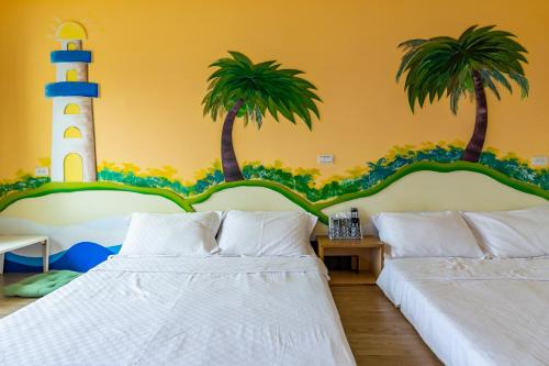 Katil atau katil-katil dalam bilik di Tropical island B&B
