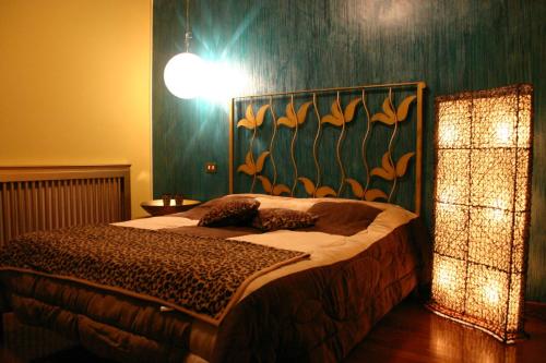 מיטה או מיטות בחדר ב-Suite Manzoni