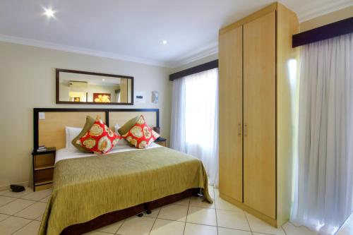 מיטה או מיטות בחדר ב-Seagull Lodge