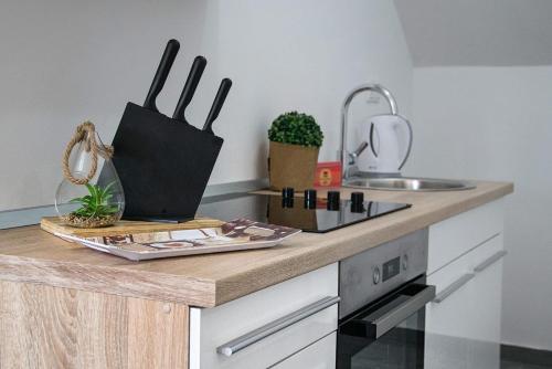 Η κουζίνα ή μικρή κουζίνα στο Apartments Escape