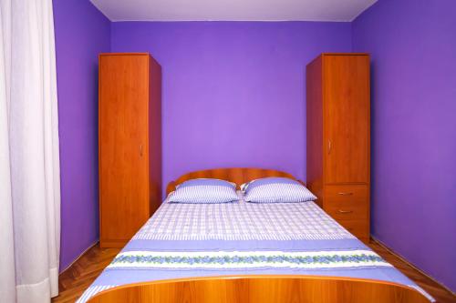 Cama o camas de una habitación en Apartments Ratković