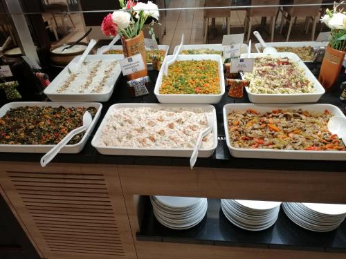 a buffet line with many different types of food at Iris Hotel & Spa in Canakkale