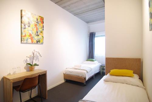 Säng eller sängar i ett rum på Stunning apartments close to Amstel river