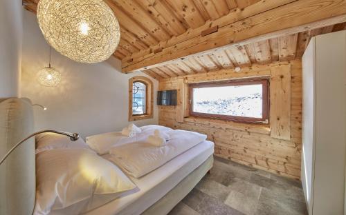 En eller flere senge i et værelse på Apartment Panorama