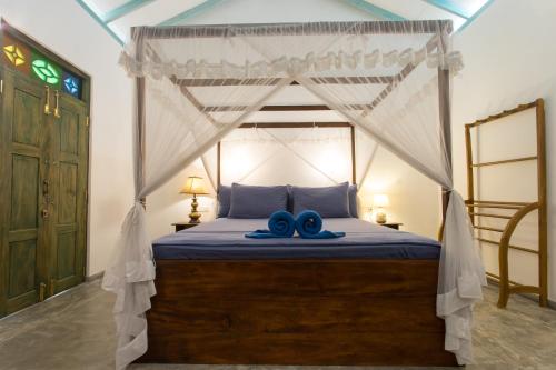 Tempat tidur dalam kamar di Forcus Cabanas