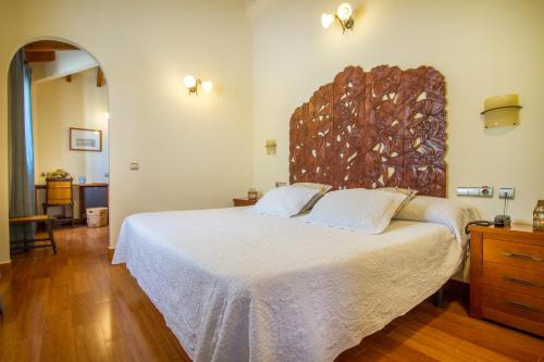 Ένα ή περισσότερα κρεβάτια σε δωμάτιο στο Hotel Tossal d'Altea