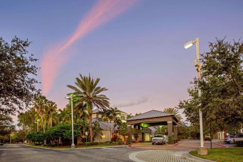 a rainbow in the sky over a street at La Quinta by Wyndham Ft. Lauderdale Plantation in Plantation