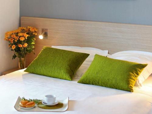 Cama o camas de una habitación en Aparthotel Adagio Access Nice Magnan