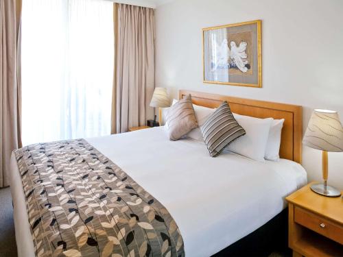 Кровать или кровати в номере The Sebel Sydney Chatswood