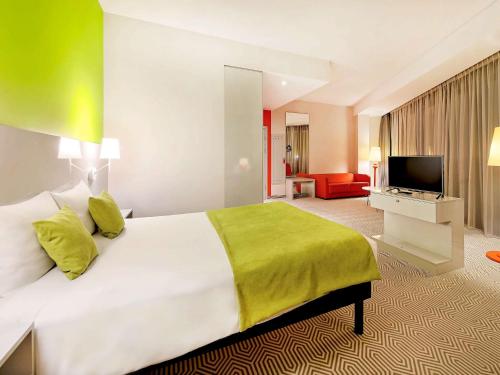 Postel nebo postele na pokoji v ubytování Ibis Styles Wroclaw Centrum