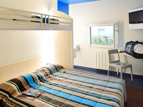 En eller flere senger på et rom på hotelF1 Blois