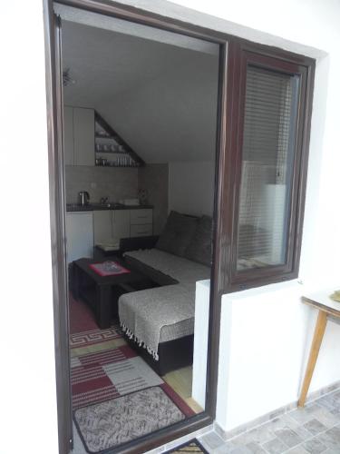 Postel nebo postele na pokoji v ubytování Apartments Vuković