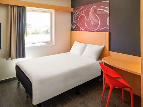 Кровать или кровати в номере Ibis Culiacan