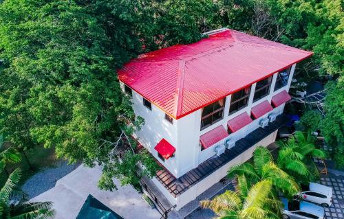 an overhead view of a house with a red roof at Nature's Village Resort in Bacolod