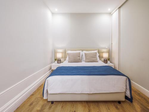Un ou plusieurs lits dans un hébergement de l'établissement Oporto View Apartments