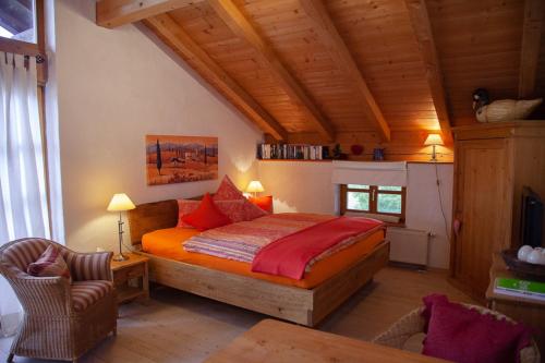 Ein Bett oder Betten in einem Zimmer der Unterkunft Chiemsee-Refugium