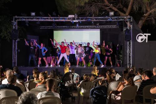 a group of people on a stage in front of a crowd at Saracen Sands Hotel & Congress Centre - Palermo in Isola delle Femmine
