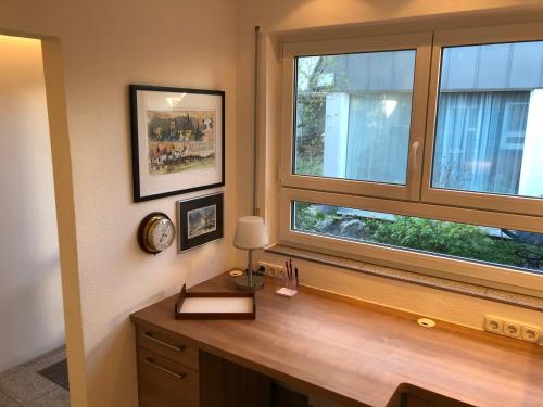 a desk in a room with a window at Apartment im Grünen in Barge
