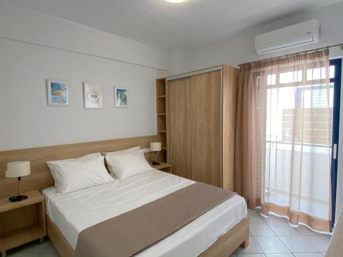 Posteľ alebo postele v izbe v ubytovaní Elounda Canali 2 Apts