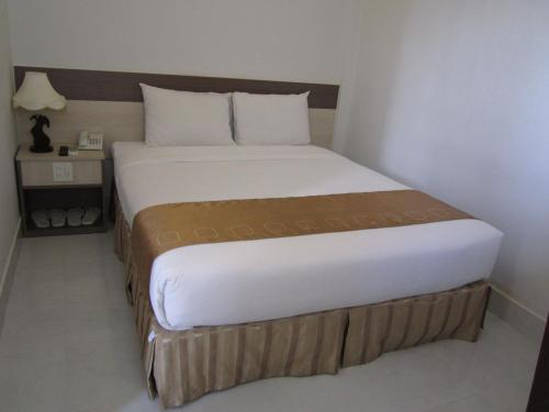 Cama o camas de una habitación en Hau Giang 2 Hotel Cần Thơ