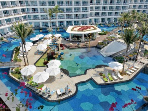 an aerial view of a resort with a swimming pool at Palace Resort Villas Yalong Bay Sanya in Sanya