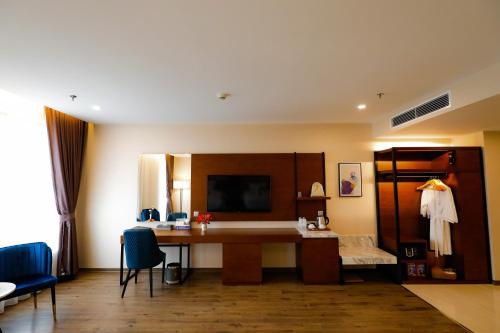 Μια τηλεόραση ή/και κέντρο ψυχαγωγίας στο Grand Phoenix Hotel Bac Ninh