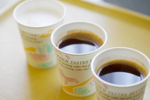 three cups of coffee sitting on a table at Hotel Pao in Hiroshima