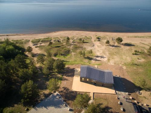 an overhead view of a building next to the water at Tulivee Villa in Liimala