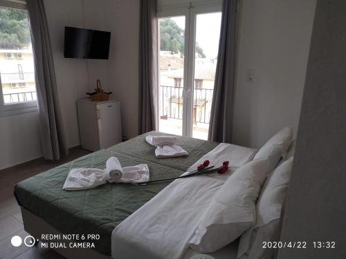 Postel nebo postele na pokoji v ubytování Central Hotel