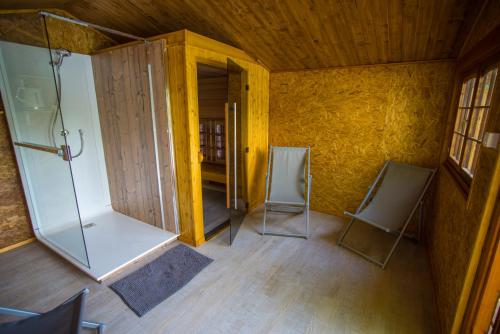 an overhead view of a room with two chairs at Camping du Château Vert in Hondainville