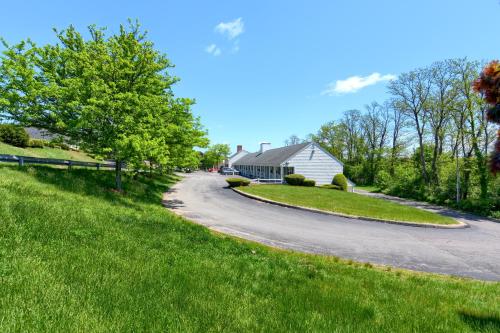 a winding road in front of a house at Knight's Inn Boston/Danvers in Danvers