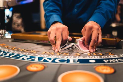 a man playing a game on a casino table at St. Eugene Golf Resort & Casino in Cranbrook