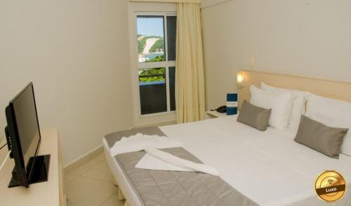 Cama o camas de una habitación en Terrazzo Flat Hotel JD