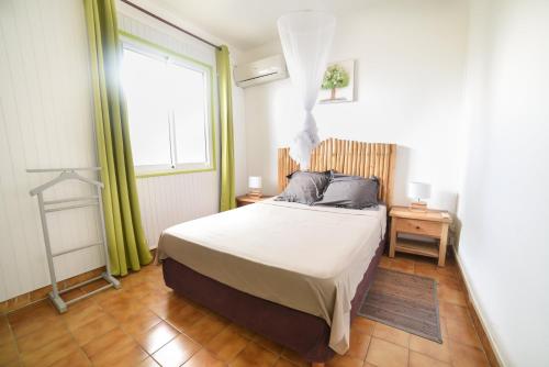 Postel nebo postele na pokoji v ubytování Lez'arlet Plage