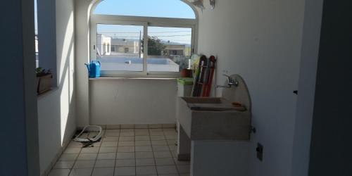 Kuchyň nebo kuchyňský kout v ubytování Le sorgenti camere e appartamenti