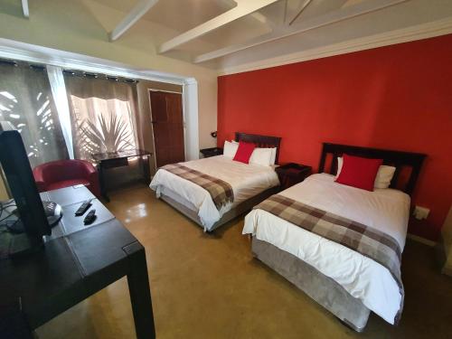 Letto o letti in una camera di Silverstone Guesthouse
