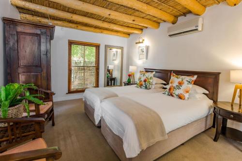 Imagen de la galería de Roosenwijn Guesthouse, en Stellenbosch