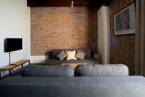Posezení v ubytování Apartamenty Folwark Boguszyn