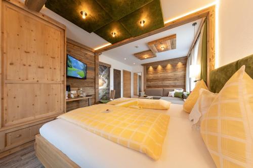 Cama o camas de una habitación en Hotel Sporthof Austria